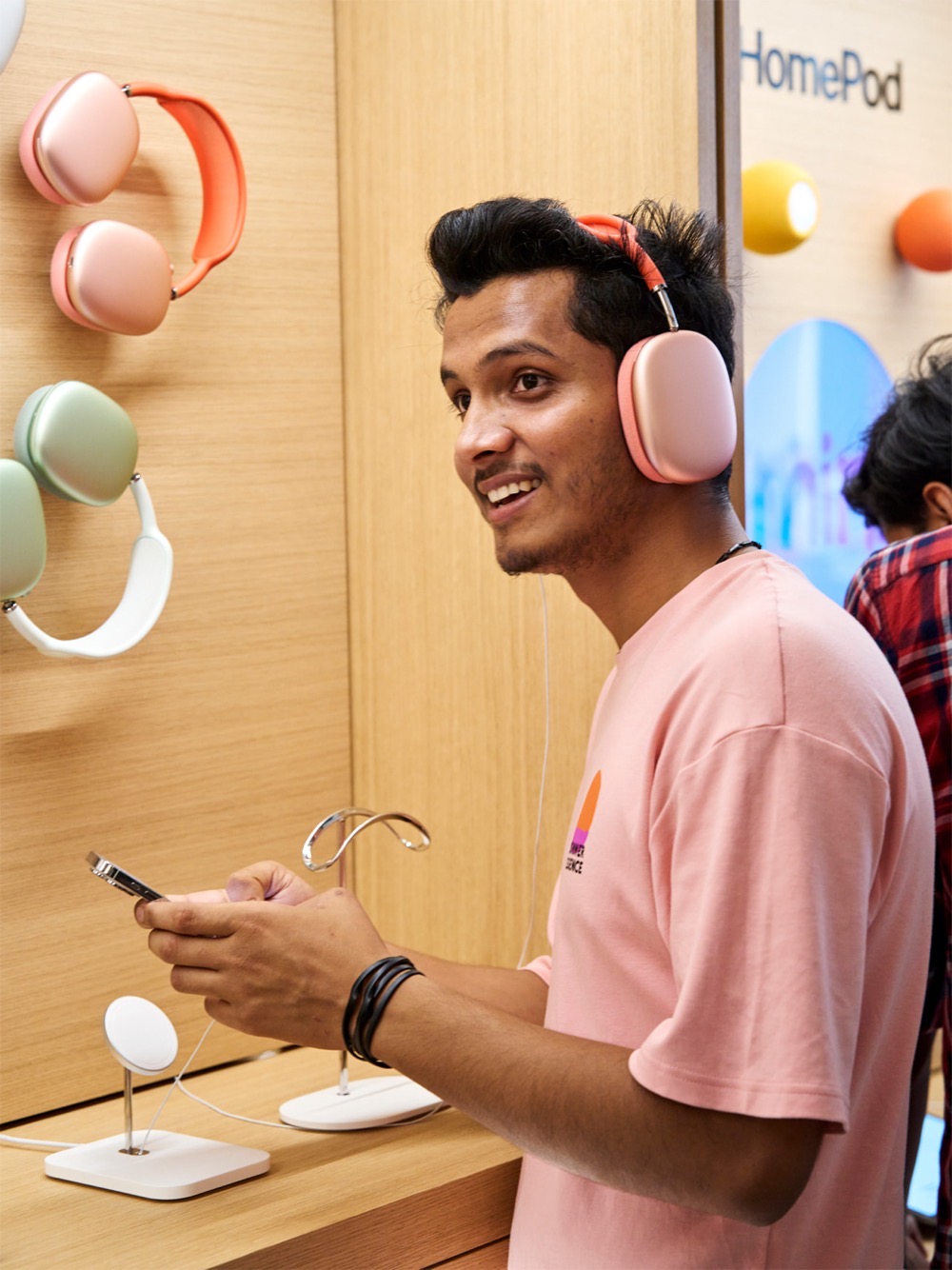Apple Saket Delhi India opening day customer with AirPods Max inline jpg large 2x