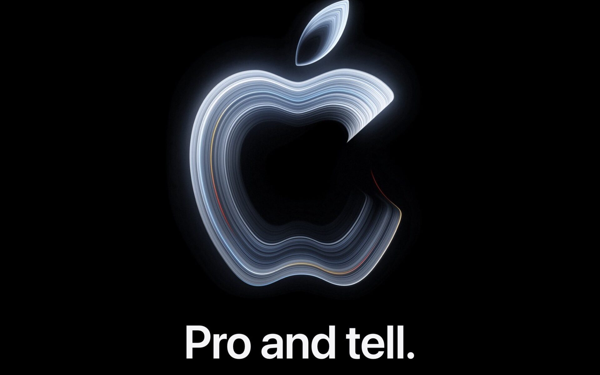 Glowing silver Apple logo on black for the Pro and Tell MacBook Pro event invite