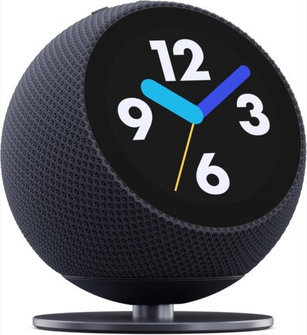 echo dot time | iPhone in Canada Spherical smart speaker with dark fabric covering and a built-in clock display on its front.